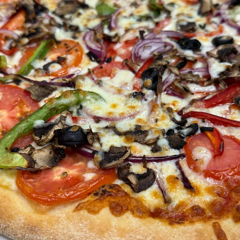 Savor our veggie pizza